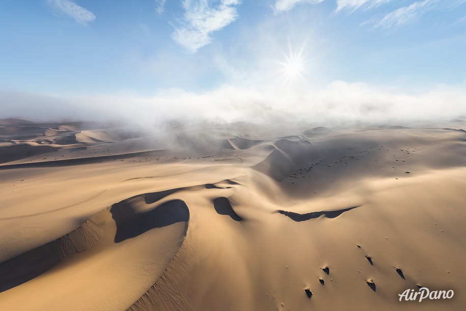 The Namibian coast is folded in thick fog