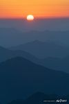 Sunset over Huangshan mountains