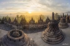 Sunrise over the Merapi volcano. Borobudur, Indonesia