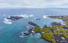 Above the southern coast of Isabela Island