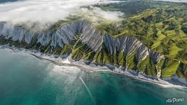 White cliffs on the coast of the Sea of Okhotsk White cliffs on the coast of the Sea of Okhotsk